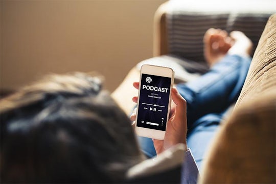 Person listening to a podcast